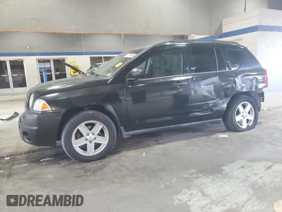 ✅ 2007 Jeep Compass Sport • VIN: 1J8FT47WX7D196544 • Лот: 91876665. Опубликован ранее на Copart с пробегом 185 044 миль. Бесплатный доступ к архиву аукционных продаж из США и подробный отчёт об истории автомобиля на DreamBid. Изображение 1.