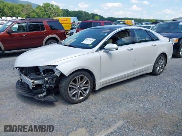 ✅ 2013 Lincoln MKZ Hybrid • VIN: 3LN6L2LU6DR807667 • Lot: 42533419. Wystawiony na IAAI z przebiegiem 90 327 mil. Bezpłatny archiwum sprzedaży aukcyjnych z USA i szczegółowy raport historii pojazdu na DreamBid. Zdjęcie 2.