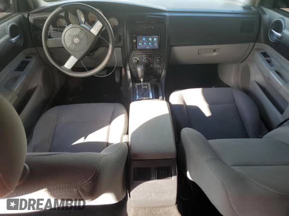 2006 Dodge Charger с VIN 2B3KA43GX6H185606, выставлен на аукционе Copart как лот 73749924 с пробегом 71 249 миль миль и Списание • Salvage title. История ставок и продаж доступна на DreamBid. Изображение 8.