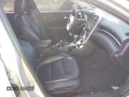 ✅ 2014 Chevrolet Malibu LTZ • VIN: 1G11H5SL6EF117001 • Lot: 43325344. Listed on IAAI with 183,202 mi. Free auction sales archive from the USA and detailed vehicle history report at DreamBid. Image 5.