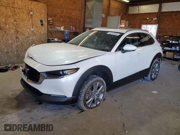 ✅ 2022 Mazda CX-30 S Premium • VIN: 3MVDMBDL1NM439300 • Lot: 82232585. Wystawiony na Copart z przebiegiem 31 649 mil. Bezpłatny archiwum sprzedaży aukcyjnych z USA i szczegółowy raport historii pojazdu na DreamBid. Zdjęcie 1.