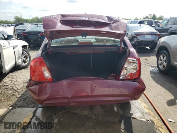 2010 Hyundai Accent GLS with VIN KMHCN4ACXAU507721, listed as a Copart auction lot 69265144 with 168,919 mi miles and Salvage title. Bid and sale history available at DreamBid. Image 6.