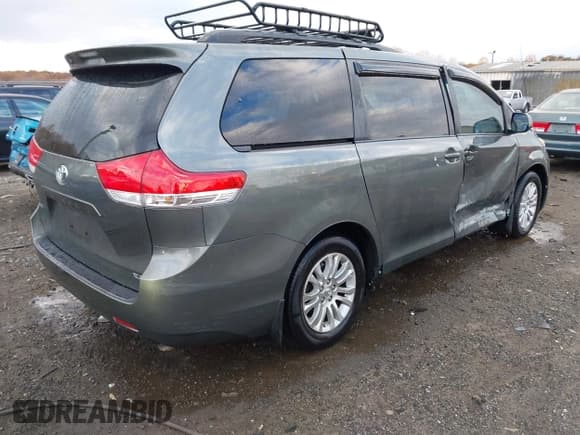 ✅ 2014 Toyota Sienna XLE • VIN: 5TDYK3DCXES436166 • Lot: 43661250. Listed on IAAI with 119,504 mi. Free auction sales archive from the USA and detailed vehicle history report at DreamBid. Image 4.