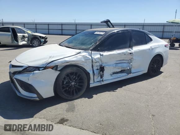 ✅ 2021 Toyota Camry Hybrid XSE • VIN: 4T1K31AK0MU028493 • Lot: 68765375. Listed on Copart with 125,781 mi. Free auction sales archive from the USA and detailed vehicle history report at DreamBid. Image 1.