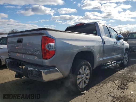 ✅ 2014 Toyota Tundra Limited • VIN: 5TFBY5F13EX403130 • Lot: 84675374. Listed on Copart with 51,894 mi. Free auction sales archive from the USA and detailed vehicle history report at DreamBid. Image 3.
