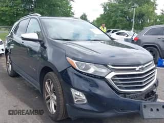 2020 Chevrolet Equinox Premier z VIN 3GNAXYEX9LS671093, wystawiony jako IAAI lot #42717937 z przebiegiem 70 675 mil mil oraz . Historia ofert i sprzedaży dostępna na DreamBid. Obrazek 1.