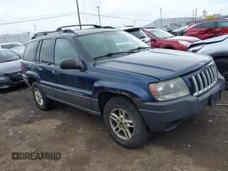 ✅ 2004 Jeep Grand Cherokee Laredo • VIN: 1J4GW48S74C309540 • Lot: 43305015. Listed on IAAI with 153,188 mi. Free auction sales archive from the USA and detailed vehicle history report at DreamBid. Image 1.