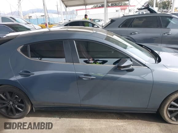 ✅ 2024 Mazda 3 S Carbon Edition • VIN: JM1BPBLMXR1652534 • Lot: 41681502. Listed on IAAI with 17,266 mi. Free auction sales archive from the USA and detailed vehicle history report at DreamBid. Image 13.