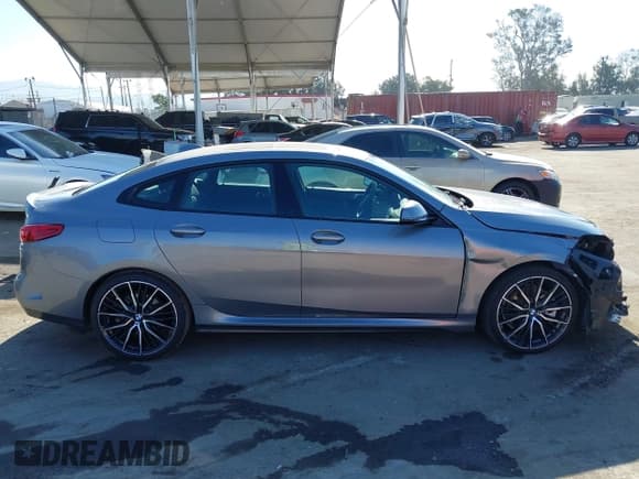 ✅ 2022 BMW 2 Series 228i • VIN: WBA53AK03N7K45712 • Лот: 43074211. Опубликован ранее на IAAI с пробегом 22 973 миль. Бесплатный доступ к архиву аукционных продаж из США и подробный отчёт об истории автомобиля на DreamBid. Изображение 13.