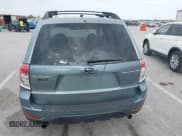 ✅ 2009 Subaru Forester X • VIN: JF2SH63619H744761 • Lot: 42036101. Listed on IAAI with 154,353 mi. Free auction sales archive from the USA and detailed vehicle history report at DreamBid. Image 6.