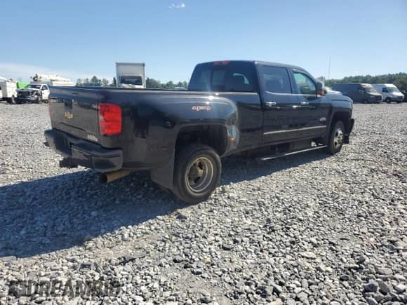 2016 Chevrolet Silverado 3500HD High Country с VIN 1GC4K1E80GF259188, выставлен на аукционе Copart как лот 57331915 с пробегом 151 974 миль миль и Списание • Salvage title. История ставок и продаж доступна на DreamBid. Изображение 4.