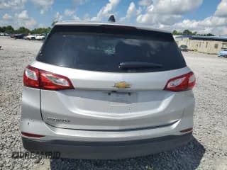 ✅ 2020 Chevrolet Equinox LS • VIN: 3GNAXHEV0LS679680 • Lot: 64928085. Wystawiony na Copart z przebiegiem 119 961 mil. Bezpłatny archiwum sprzedaży aukcyjnych z USA i szczegółowy raport historii pojazdu na DreamBid. Zdjęcie 6.
