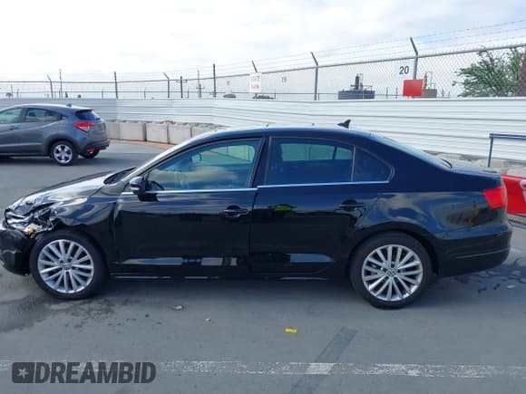 ✅ 2014 Volkswagen Jetta TDI w/Premium/Nav • VIN: 3VWLL7AJ3EM404934 • Lot: 42809693. Listed on IAAI with 142,331 mi. Free auction sales archive from the USA and detailed vehicle history report at DreamBid. Image 14.