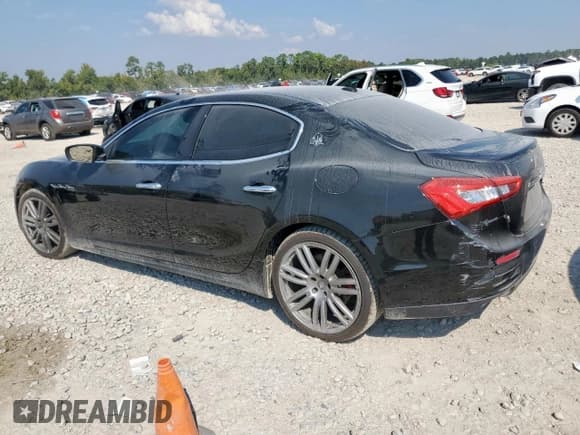 ✅ 2017 Maserati Ghibli • VIN: ZAM57XSL6H1213781 • Lot: 85145515. Listed on Copart with 122,899 mi. Free auction sales archive from the USA and detailed vehicle history report at DreamBid. Image 2.