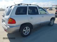 ✅ 2004 Hyundai Santa Fe GLS • VIN: KM8SC13D64U837768 • Lot: 43769846. Listed on IAAI with 147,075 mi. Free auction sales archive from the USA and detailed vehicle history report at DreamBid. Image 4.