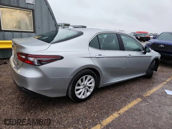 2023 Toyota Camry LE with VIN 4T1C11AK2PU149640, listed as a Copart auction lot 89708915 with 83,359 mi miles and Clean title. Bid and sale history available at DreamBid. Image 3.