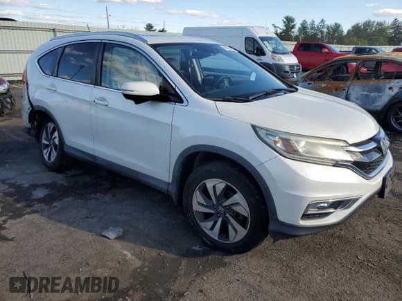 ✅ 2015 Honda CR-V Touring • VIN: 5J6RM4H91FL024704 • Lot: 84038285. Listed on Copart with 111,854 mi. Free auction sales archive from the USA and detailed vehicle history report at DreamBid. Image 4.