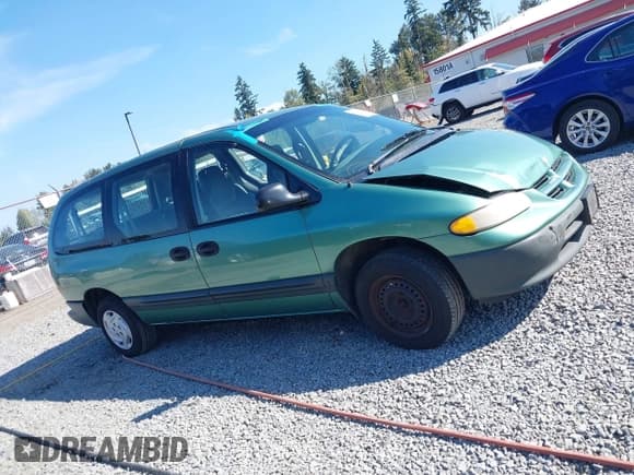✅ 1998 Dodge Caravan SE • VIN: 2B4GP44G2WR536436 • Lot: 43249405. Listed on IAAI with 229,731 mi. Free auction sales archive from the USA and detailed vehicle history report at DreamBid. Image 13.