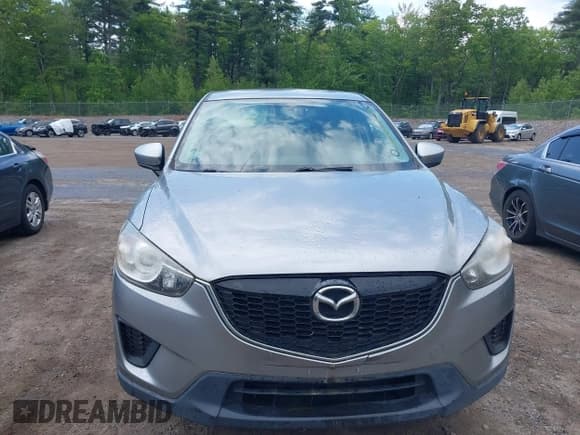 ✅ 2014 Mazda CX-5 Sport • VIN: JM3KE2BEXE0322870 • Lot: 42352920. Listed on IAAI with 368,209 mi. Free auction sales archive from the USA and detailed vehicle history report at DreamBid. Image 13.
