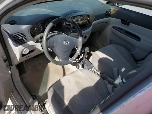 2007 Hyundai Accent GL z VIN KMHCN45C77U073194, wystawiony jako Copart lot #42955445 z przebiegiem 248 364 mil mil oraz Nie do naprawy • Non repairable. Historia ofert i sprzedaży dostępna na DreamBid. Obrazek 8.