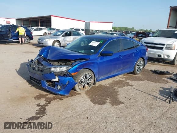 ✅ 2017 Honda Civic EX-L • VIN: 19XFC1F78HE013884 • Lot: 42019953. Listed on IAAI with 50,132 mi. Free auction sales archive from the USA and detailed vehicle history report at DreamBid. Image 2.