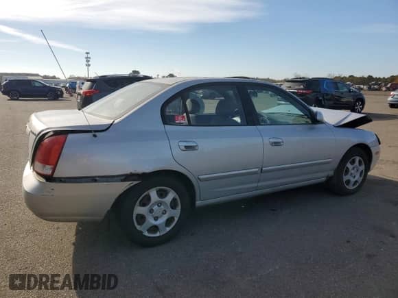 2001 Hyundai Elantra GLS с VIN KMHDN45D11U212224, выставлен на аукционе Copart как лот 77389324 с пробегом 180 758 миль миль и Списание • Salvage title. История ставок и продаж доступна на DreamBid. Изображение 3.
