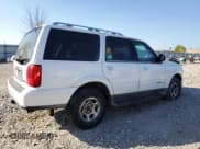 ✅ 2002 Lincoln Navigator • VIN: 5LMFU28R62LJ10770 • Lot: 81852735. Listed on Copart with 107,965 mi. Free auction sales archive from the USA and detailed vehicle history report at DreamBid. Image 3.