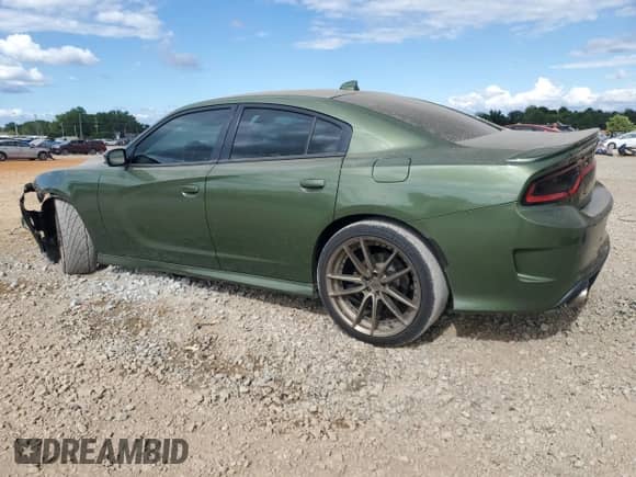 2018 Dodge Charger SXT Plus with VIN 2C3CDXHG1JH228697, listed as a Copart auction lot 68356945 with 117,117 mi miles and Salvage title. Bid and sale history available at DreamBid. Image 2.