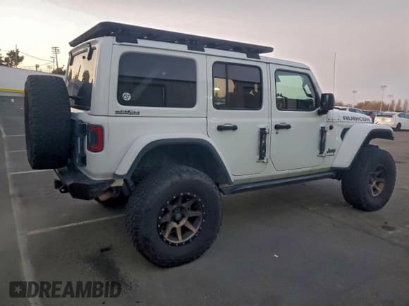 ✅ 2020 Jeep Wrangler Unlimited Rubicon • VIN: 1C4HJXFN1LW223385 • Лот: 94774755. Опубликован ранее на Copart с пробегом 110 534 миль. Бесплатный доступ к архиву аукционных продаж из США и подробный отчёт об истории автомобиля на DreamBid. Изображение 3.