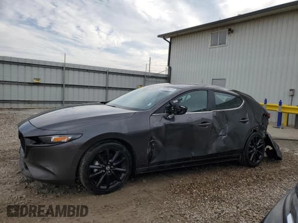 ✅ 2024 Mazda 3 S Select Sport • VIN: JM1BPAKM7R1712605 • Лот: 91647885. Опубликован ранее на Copart с пробегом 41 288 миль. Бесплатный доступ к архиву аукционных продаж из США и подробный отчёт об истории автомобиля на DreamBid. Изображение 1.