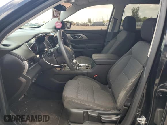 ✅ 2020 Chevrolet Traverse LS • VIN: 1GNERFKW4LJ188446 • Lot: 64598614. Wystawiony na Copart z przebiegiem 64 715 mil. Bezpłatny archiwum sprzedaży aukcyjnych z USA i szczegółowy raport historii pojazdu na DreamBid. Zdjęcie 7.