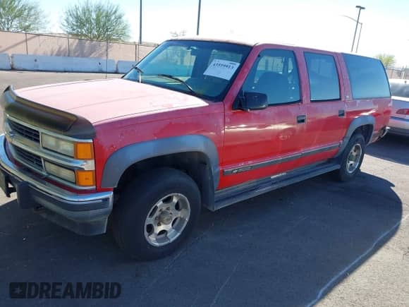 1994 Chevrolet Suburban z VIN 1GNFK16K9RJ334433, wystawiony jako IAAI lot #43559913 z przebiegiem 322 899 mil mil oraz . Historia ofert i sprzedaży dostępna na DreamBid. Obrazek 12.