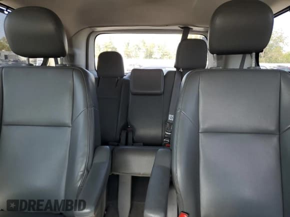 ✅ 2014 Volkswagen Routan SE • VIN: 2C4RVABG9ER134740 • Lot: 80742065. Listed on Copart with 152,602 mi. Free auction sales archive from the USA and detailed vehicle history report at DreamBid. Image 10.
