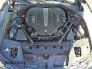 ✅ 2013 BMW 7 Series 750i • VIN: WBAYA8C51DC996576 • Лот: 89716555. Опубликован ранее на Copart с пробегом 135 727 миль. Бесплатный доступ к архиву аукционных продаж из США и подробный отчёт об истории автомобиля на DreamBid. Изображение 11.