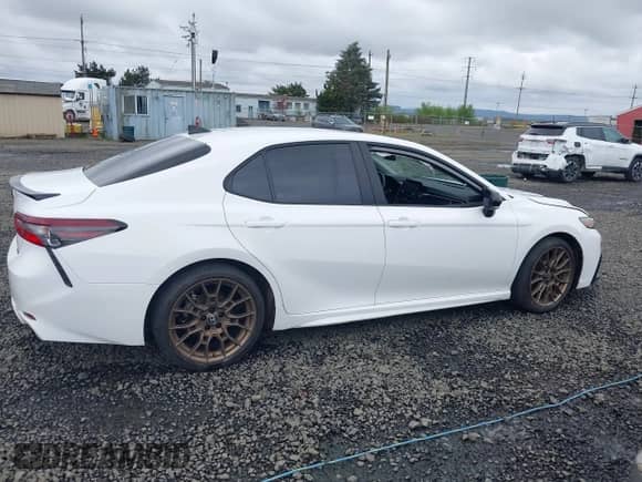 2023 Toyota Camry SE with VIN 4T1G11BKXPU103277, listed as a IAAI auction lot 41978396 with 66,624 mi miles and . Bid and sale history available at DreamBid. Image 13.