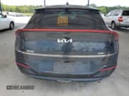 ✅ 2022 Kia EV6 GT-Line • VIN: KNDC44LA8N5030970 • Лот: 65454035. Опубликован ранее на Copart с пробегом 63 086 миль. Бесплатный доступ к архиву аукционных продаж из США и подробный отчёт об истории автомобиля на DreamBid. Изображение 6.