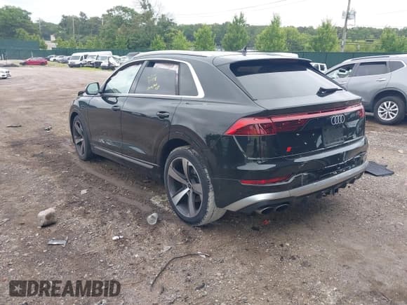 ✅ 2024 Audi SQ8 Prestige • VIN: WA1CWBF18RD003395 • Лот: 42698220. Опубликован ранее на IAAI с пробегом 7 410 миль. Бесплатный доступ к архиву аукционных продаж из США и подробный отчёт об истории автомобиля на DreamBid. Изображение 3.