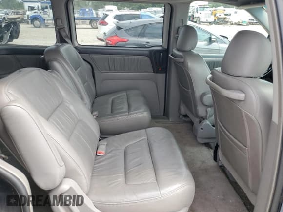 ✅ 2003 Honda Odyssey EX-L • VIN: 5FNRL18753B142601 • Lot: 65428965. Wystawiony na Copart z przebiegiem 203 995 mil. Bezpłatny archiwum sprzedaży aukcyjnych z USA i szczegółowy raport historii pojazdu na DreamBid. Zdjęcie 10.