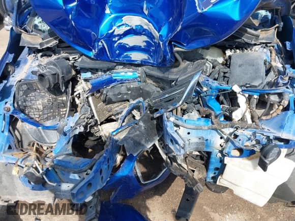 2018 Chevrolet Cruze LT z VIN 1G1BE5SM0J7147802, wystawiony jako IAAI lot #43443462 z przebiegiem Nie podano mil oraz . Historia ofert i sprzedaży dostępna na DreamBid. Obrazek 10.