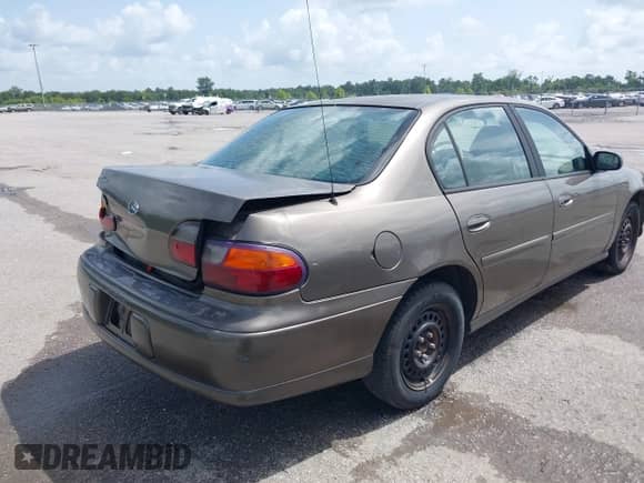 2000 Chevrolet Malibu z VIN 1G1ND52J3Y6351094, wystawiony jako IAAI lot #42703471 z przebiegiem 297 098 mil mil oraz . Historia ofert i sprzedaży dostępna na DreamBid. Obrazek 4.