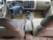 ✅ 1997 Chevrolet Blazer LT • VIN: 1GNDT13W4V2254280 • Lot: 44920175. Wystawiony na Copart z przebiegiem 151 725 mil. Bezpłatny archiwum sprzedaży aukcyjnych z USA i szczegółowy raport historii pojazdu na DreamBid. Zdjęcie 8.