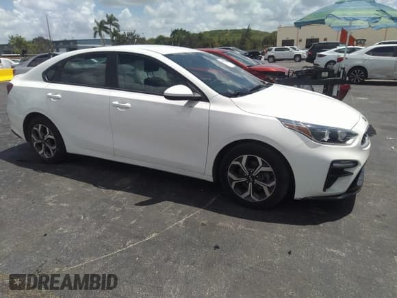 ✅ 2021 Kia Forte LXS • VIN: 3KPF24AD6ME322989 • Lot: 42010435. Listed on IAAI with 84,346 mi. Free auction sales archive from the USA and detailed vehicle history report at DreamBid. Image 1.