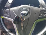 ✅ 2013 Chevrolet Captiva Sport LT • VIN: 3GNAL3EKXDS614650 • Lot: 42229850. Wystawiony na IAAI z przebiegiem 141 673 mil. Bezpłatny archiwum sprzedaży aukcyjnych z USA i szczegółowy raport historii pojazdu na DreamBid. Zdjęcie 11.