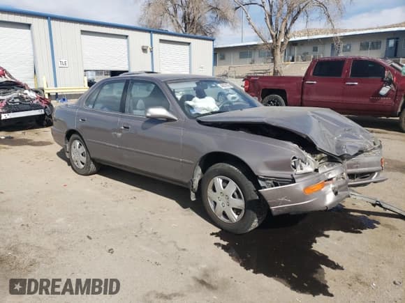 ✅ 1994 Toyota Camry LE • VIN: JT2GK12E2R0050878 • Лот: 46878005. Опубликован ранее на Copart с пробегом 152 211 миль. Бесплатный доступ к архиву аукционных продаж из США и подробный отчёт об истории автомобиля на DreamBid. Изображение 4.