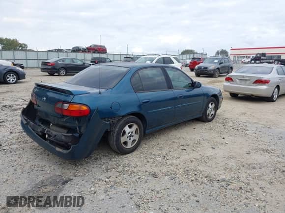 2003 Chevrolet Malibu LS z VIN 1G1NE52J43M679268, wystawiony jako IAAI lot #40734140 z przebiegiem 64 325 mil mil oraz . Historia ofert i sprzedaży dostępna na DreamBid. Obrazek 4.