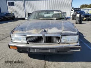 ✅ 1994 Jaguar XJ • VIN: SAJHX1744RC694427 • Lot: 68865655. Listed on Copart with 151,204 mi. Free auction sales archive from the USA and detailed vehicle history report at DreamBid. Image 5.