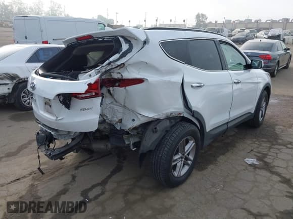 ✅ 2017 Hyundai Santa Fe 2.4L • VIN: 5NMZU3LB3HH034679 • Лот: 43585420. Опубликован ранее на IAAI с пробегом 98 763 миль. Бесплатный доступ к архиву аукционных продаж из США и подробный отчёт об истории автомобиля на DreamBid. Изображение 4.