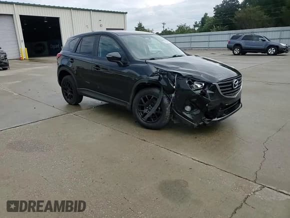 ✅ 2016 Mazda CX-5 Touring • VIN: JM3KE4CY8G0891689 • Лот: 84039495. Опубликован ранее на Copart с пробегом 87 935 миль. Бесплатный доступ к архиву аукционных продаж из США и подробный отчёт об истории автомобиля на DreamBid. Изображение 14.