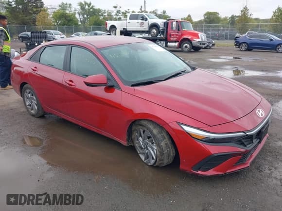 ✅ 2024 Hyundai Elantra SEL • VIN: KMHLM4DG0RU734414 • Lot: 43235886. Listed on IAAI with 13,874 mi. Free auction sales archive from the USA and detailed vehicle history report at DreamBid. Image 1.