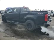 ✅ 2018 Chevrolet Colorado 2WD Z71 • VIN: 1GCGSDEN8J1237965 • Лот: 59533885. Опубликован ранее на Copart с пробегом 103 507 миль. Бесплатный доступ к архиву аукционных продаж из США и подробный отчёт об истории автомобиля на DreamBid. Изображение 2.